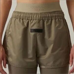 NWT Essentials Fear Of God Women's
Desert Taupe Running Shorts, MED
